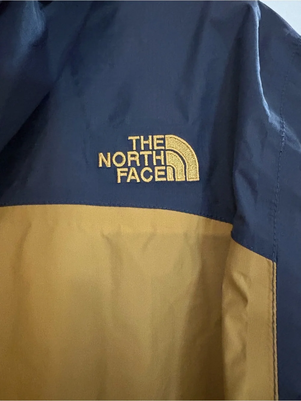 The North Face Men’s Navy and Mustard Hooded Rain Jacket